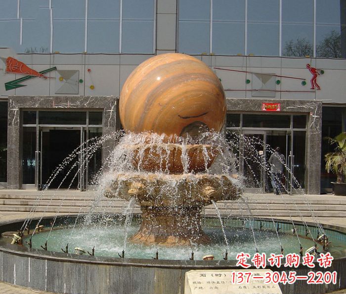 张家口石来运转球晚霞红风水球石雕