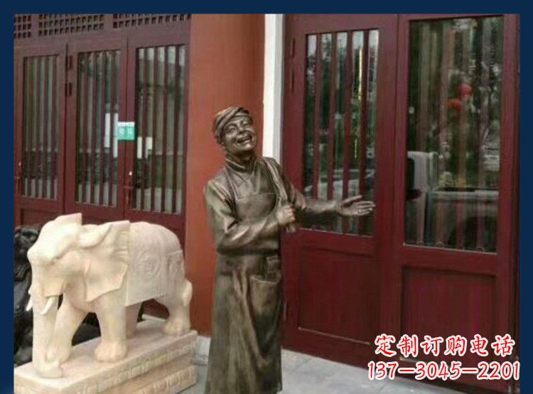 张家口铜雕店小二酒店迎宾人物雕塑